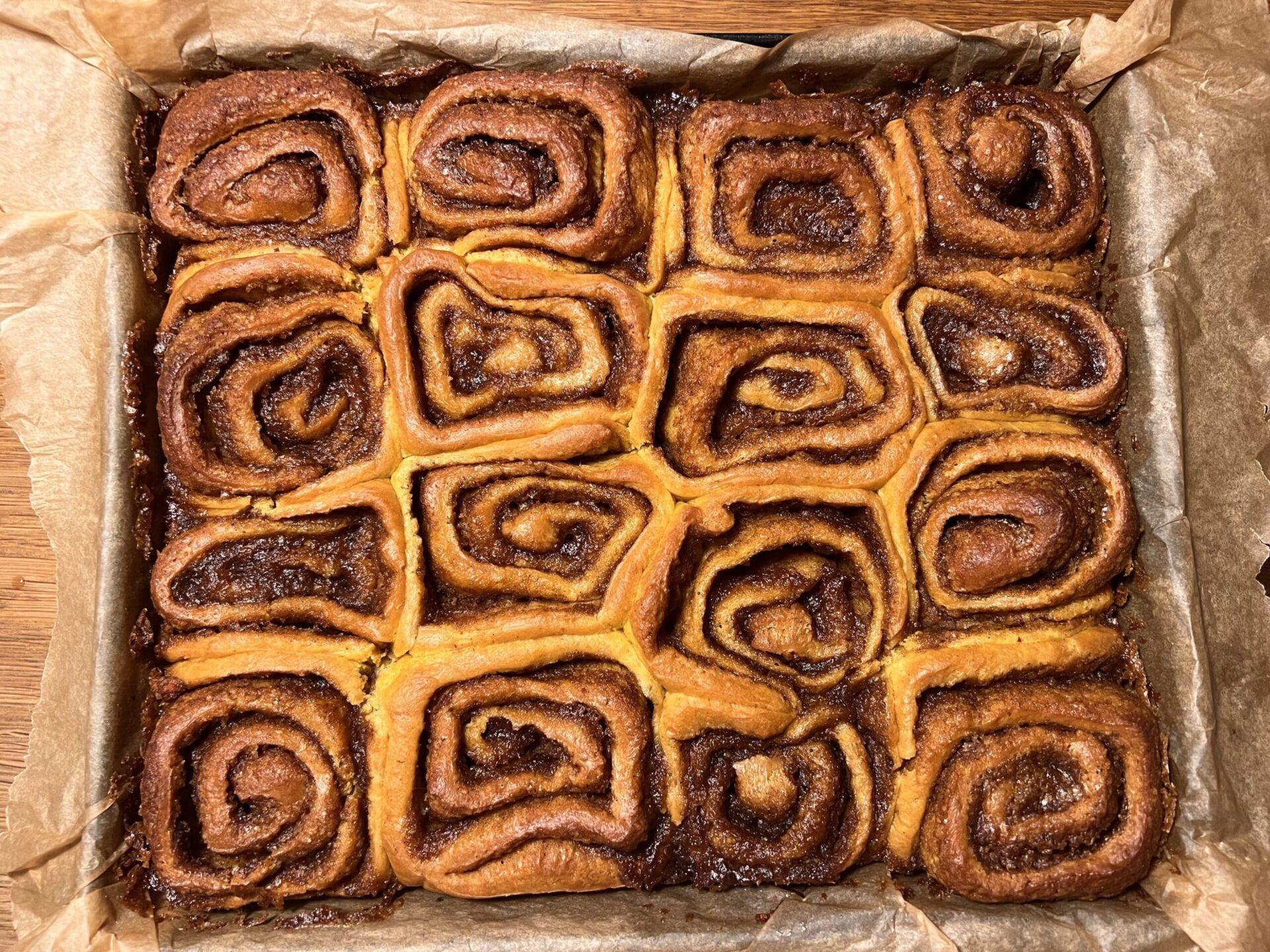 Full tray of freshly baked spicy pumpkin rolls